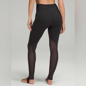 Lululemon Nulu and Crisscross Black Mesh Stirrup Tight. Size 8.